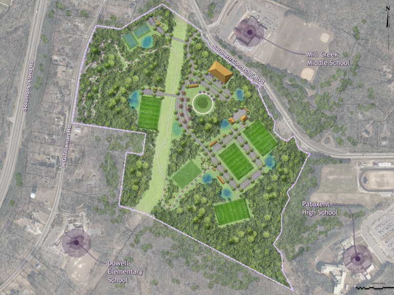 Aerial layout of a park featuring artificial turf fields, walking paths, and gathering areas.